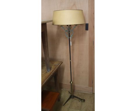 A mid-century French brass and metal standard lamp