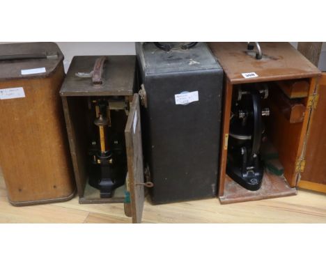 A Cooke Baker microscope, projection model, A Watson microscope, cased, a Beck model no. 47 microscope, no 45675, cased and a