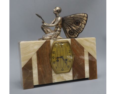 A French Art Deco marble mantel clock, with a cold painted fairy mount height 34cm