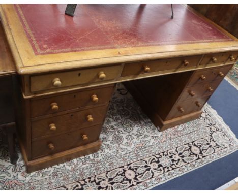 A Victorian light oak pedestal partners desk W.152cm