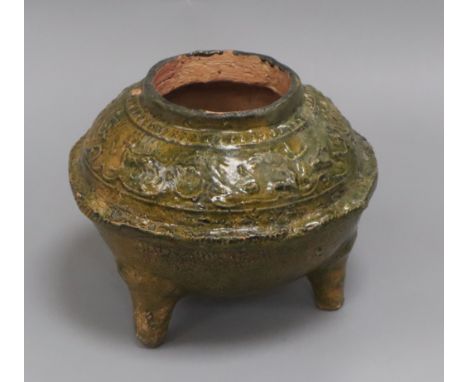 A Chinese green-glazed tripod jar with hunting scenes, Han Dynasty height 15cm