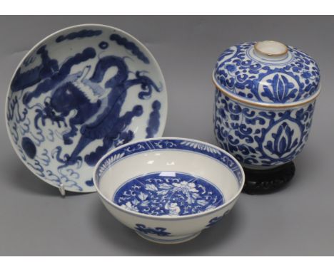 A Chinese Kangxi period blue and white U-shaped jar and cover, height 15cm, together with a Chinese blue and white bowl and a