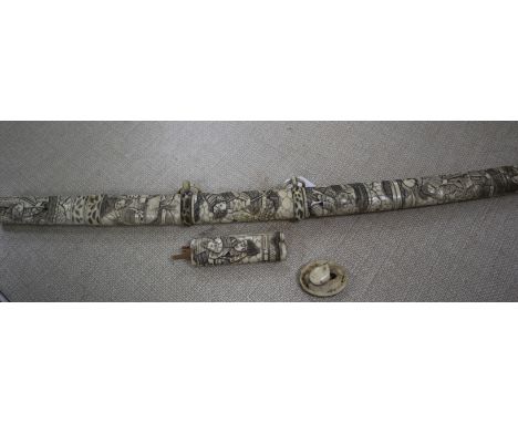 A Japanese katana, with late 19th century carved ivory scabbard, with a 16th century blade of the Yamoto School, inscribed "K