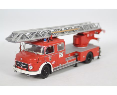 Minichamps - An unboxed 1966 Mercedes Benz 1113 Aerial Ladder Fire Engine in 1:43 scale # 031070. This model has been out on 