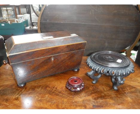 A 19TH CENTURY FIGURED MAHOGANY TEA CADDY and two Oriental stands