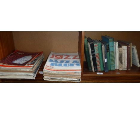 A COLLECTION OF BOOKS on the subject of jazz and various vintage jazz magazines