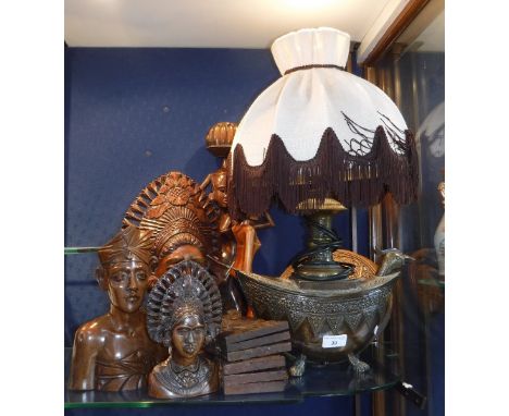 A COLLECTION OF CARVED HARDWOOD ASIAN FIGURES, two small folding tables and a patinated metal table lamp