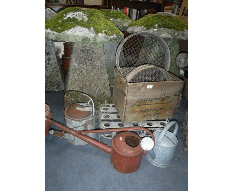 THREE VINTAGE GALVANIZED WATERING CANS, two garden sieves and similar items