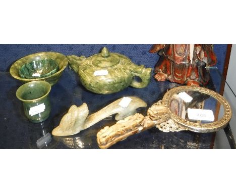 A COLLECTION OF CARVED 'JADE' ITEMS including a hand mirror, belt hook and others