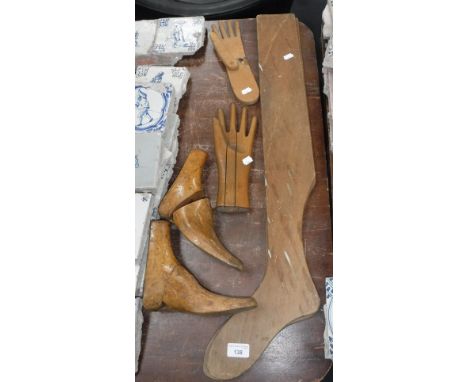 A PAIR OF VINTAGE WOODEN SHOE LASTS, a pair of wooden stocking stretchers and similar items
