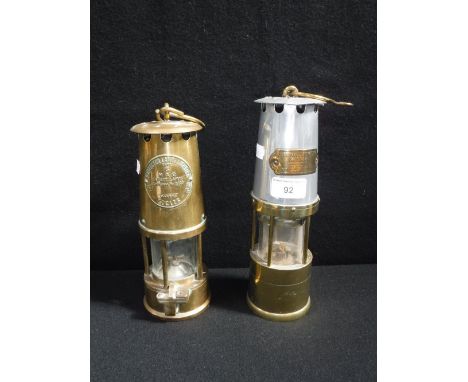 A BRASS ECCLES MINER'S LAMP and another similar
