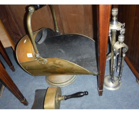 A 19TH CENTURY BRASS HELMET COAL SCUTTLE  and a set of fireplace tools