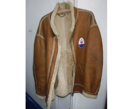 A LIGHT BROWN FLEECE LINED FLYING JACKET with internal label 'Spirit Sharp' Made in Italy, with an applied Maserati badge to 