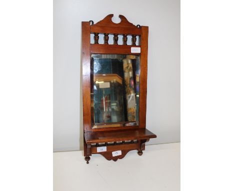 A vintage mirrored wall hanging unit with shelf h56cm 