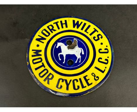 A North Wilts Motor Cycle &amp; Light Car Club circular enamel plaque, good gloss, 4 1/2" diameter.