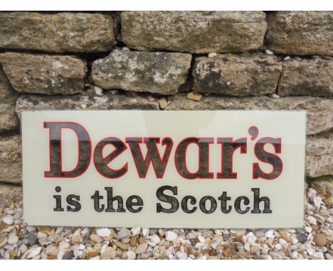 A rectangular glass advertising panel for Dewar's Scotch Whisky, 25 x 10".