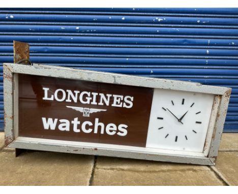 A large and rare wall mounted double sided clock lightbox advertising Longines watches, by repute working and clocks operatin