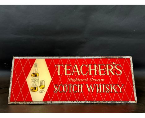 A Teacher's Highland Cream Scotch Whisky illuminated lightbox, 26" w x 9" h x 8 1/2" d.