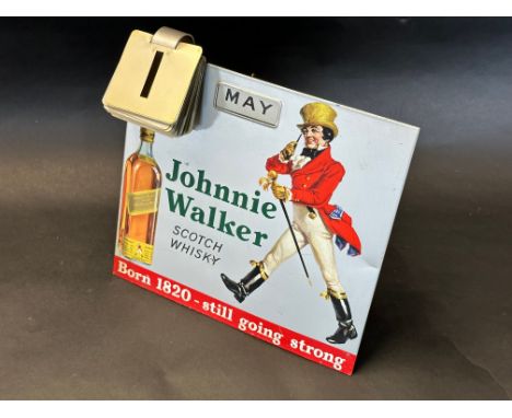 A desktop tin calendar advertising Johnnie Walker Scotch Whisky, 9 1/2" x 9".