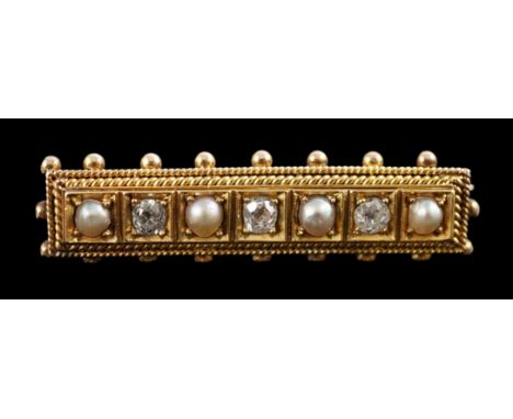 An early 20th century gold three stone diamond and four stone split pearl set bar brooch, with sphere set border, 43mm, gross