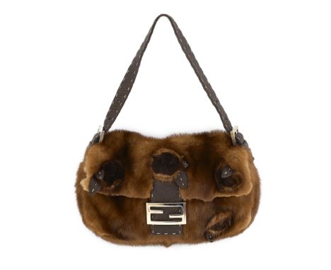 A rare vintage Fendi Baguette brown mink shoulder bag, with brown leather stitched strap, original storage bag and metal labe