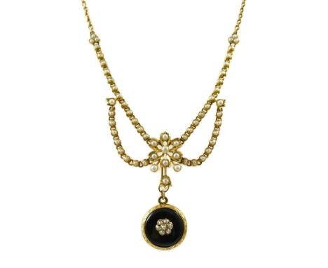 A Victorian gold, black enamel and seed pearl set mourning pendant necklace, the pendant verso with plaited hair and gold wir