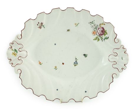 A good Chelsea silver-shape dish, c.1752, the shape attributed to the silversmith Nicholas Sprimont, the edge picked out in b