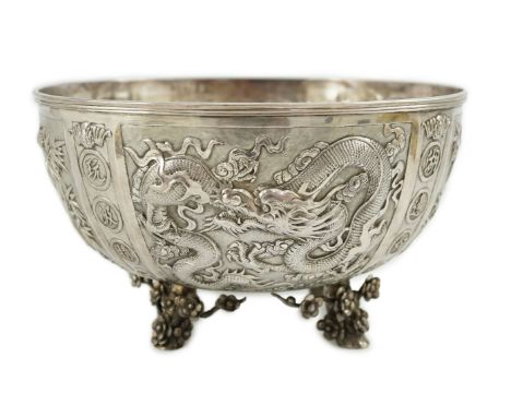 A late 19th/early 20th century Chinese Export silver rose bowl, embossed with character marks, dragons and birds amongst bamb