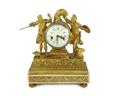 Viger à Paris. An early 19th century French ormolu mantel clock, surmounted with figures of a King and Roman soldier holding 