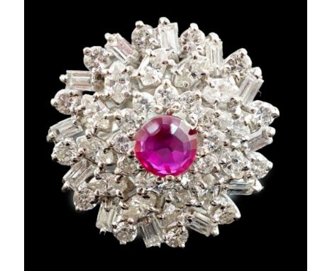 A modern 18ct white gold, ruby and round, baguette and marquise cut diamond cluster set dress ring, the ruby loose due to thr