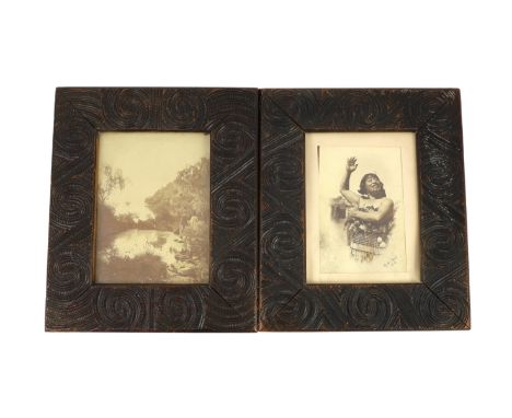 A pair of Maori carved wood photograph frames containing contemporary New Zealand photographs c.1900-10, carved in relief wit