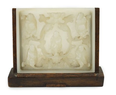 An unusual Chinese white jade plaque, 18th/19th century, carved in high relief with three seated immortals and two acrobats s