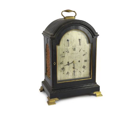 Stuart of Newcastle. A George III ebonised bracket clock, with plain architectural case, the arched silvered dial with subsid