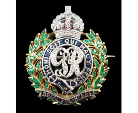 A gold and platinum, ruby, sapphire, emerald and diamond chip set Royal Engineers brooch, height 35mm, gross weight 12.3 gram