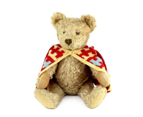 A large Steiff blonde mohair teddy bear, circa 1920, with growler, height 48cm***CONDITION REPORT***PLEASE NOTE:- Prospective