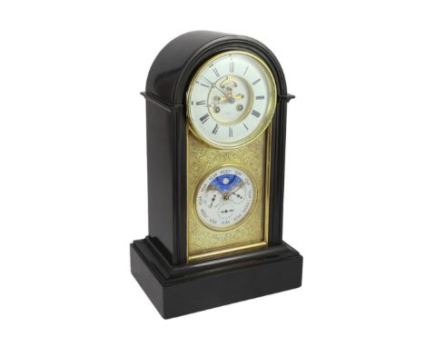 Henri Marc, Paris. A 19th century French arched top black marble mantel clock with perpetual calendar, with white enamelled c