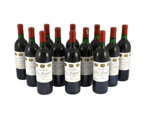 Twelve bottles of Clos Fourtet Saint Emillion Grand Cru 1989***CONDITION REPORT***Some light scuffing and further dirt markin