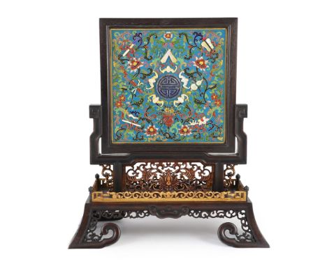 A Chinese cloisonné enamel, hardstone and mother-of-pearl mounted table screen, with pierced and carved wood stand, 42cm high