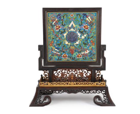 A Chinese cloisonné enamel, hardstone and mother-of-pearl mounted table screen, with pierced and carved wood stand, 42cm high