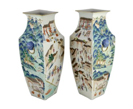 A pair of large Chinese famille rose fencai square baluster vases, 19th century, each painted to three sides with figures in 