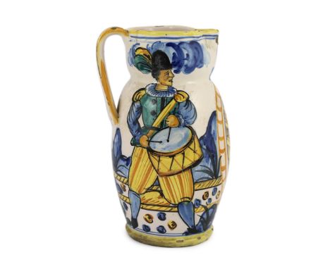 An Italian maiolica jug (boccale), probably Montelupo, 18th/19th century, painted with a soldier holding a stiletto and an ax
