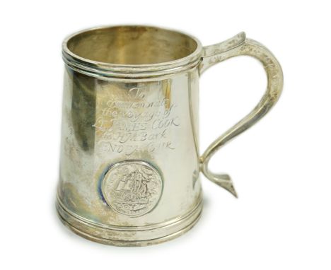 A cased Elizabeth II silver limited edition mug, engraved to commemorate the voyage of Lt. James Cook, in H.M. Bark Endeavour