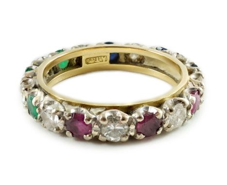 A modern 18ct gold, emerald, sapphire, ruby and diamond set full eternity ring, size O, gross weight 4.5 grams.***CONDITION R