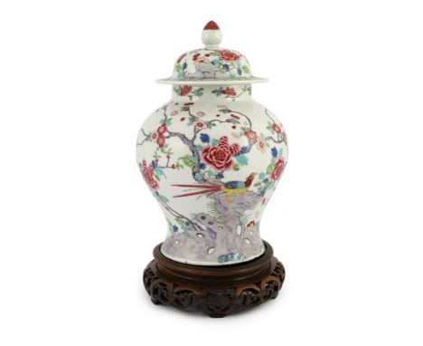 A Chinese famille rose fencai 'pheasant' vase and cover, 19th century, Jiaqing-Daoguang period, painted with two pheasants am