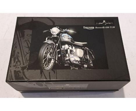 Minichamps, a boxed Classic Bike Series 1:12 Scale Triumph Bonneville 650 T120. Although unchecked for completeness condition