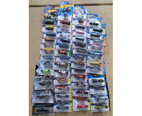 Mattel Hot Wheels a carded group to include; Art Cars, Star Wars, City Works, Retro Races as well as other series'. Condition