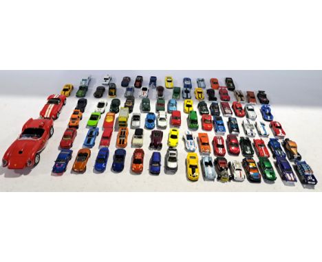 Hotwheels, Matchbox, Corgia and similar an uboxed mixed scale car group, lot also includes two car related books. Conditions 