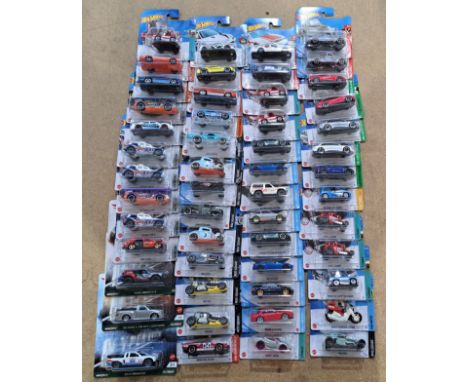 Mattel Hot Wheels a carded group to include; Hyper Haulers, Tooned, Daredevils, Rod Squad as well as other series'. Condition