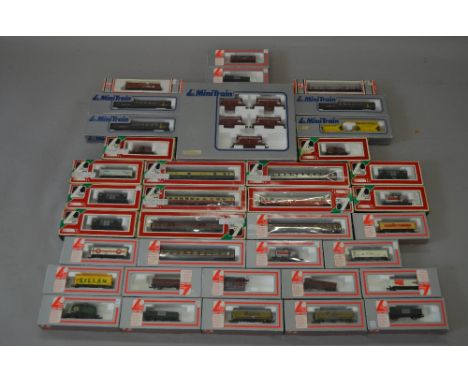 N Gauge. Lima 36 x boxed rolling stock. Including coaches & mixed freight stock. Includes multiple hopper wagon pack. Overall