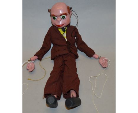 Pelham Puppet SL Supercar Dr Beaker: painted features, wearing brown suit, yellow waistcoat, white shirt and black tie. Overa